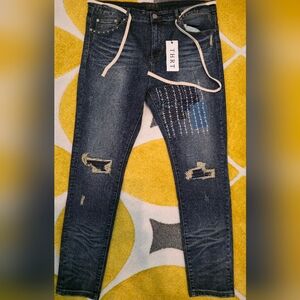 THRT blue and navy denim jeans with a distressed, patchwork and a drawstring